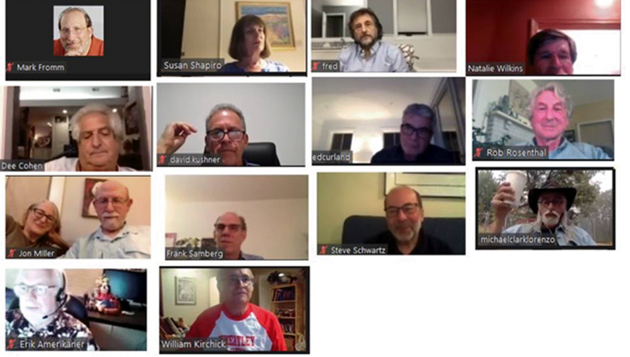 A group of people posing for the camera

Description automatically generated