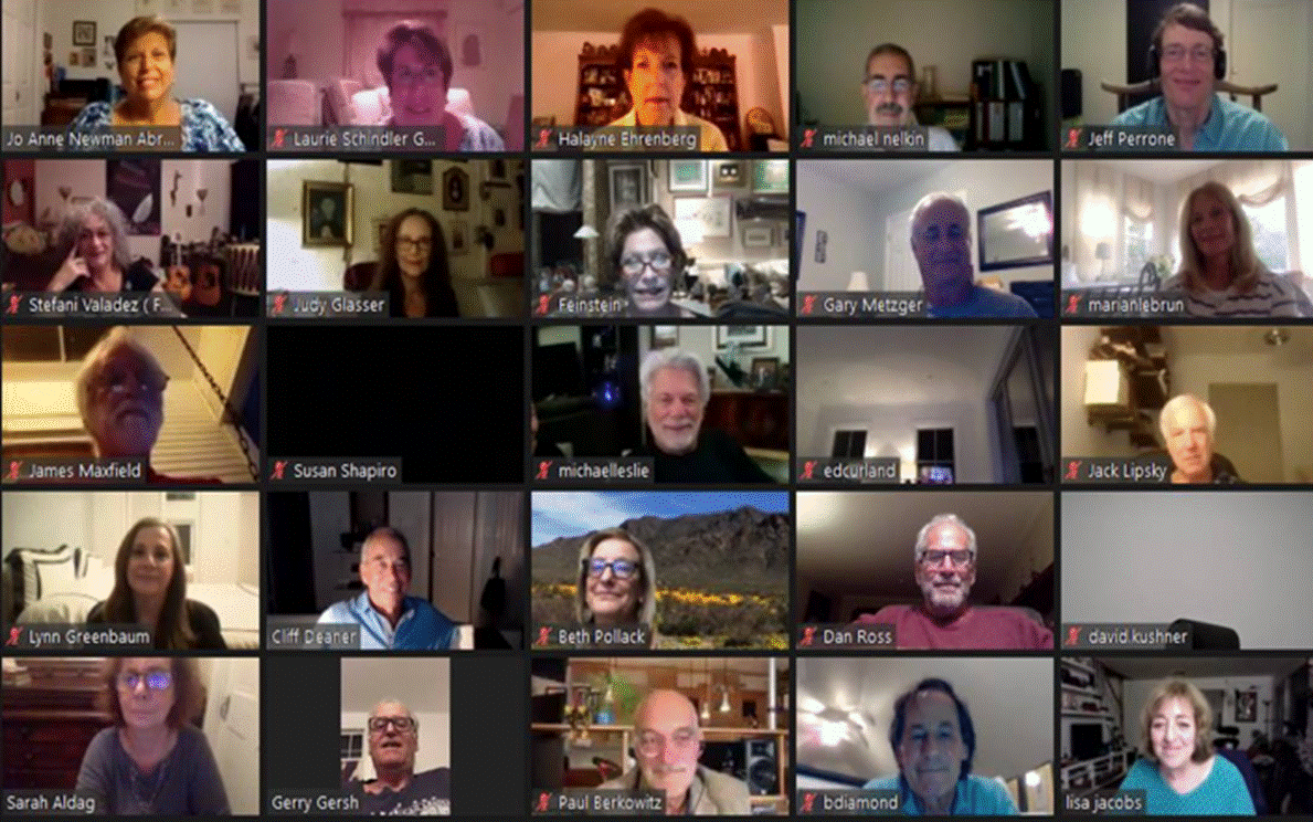 A group of people posing for a photo

Description automatically generated