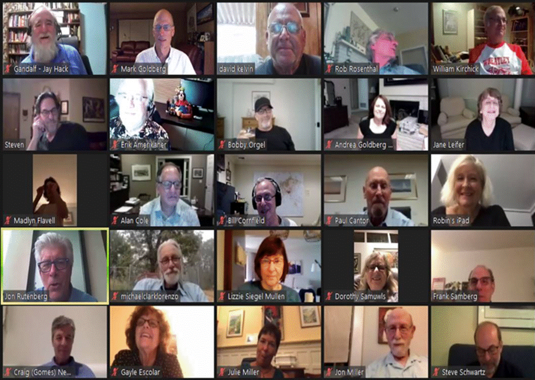 A group of people posing for a photo

Description automatically generated