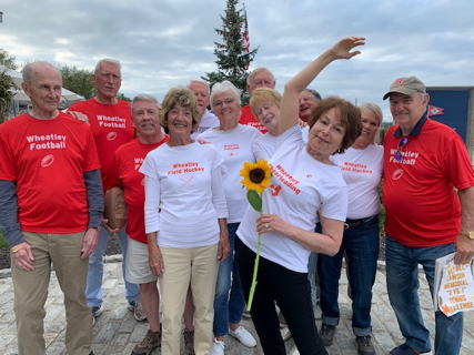 A group of people posing for a photo

Description automatically generated