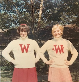 A picture containing text, posing, person, standing

Description automatically generated